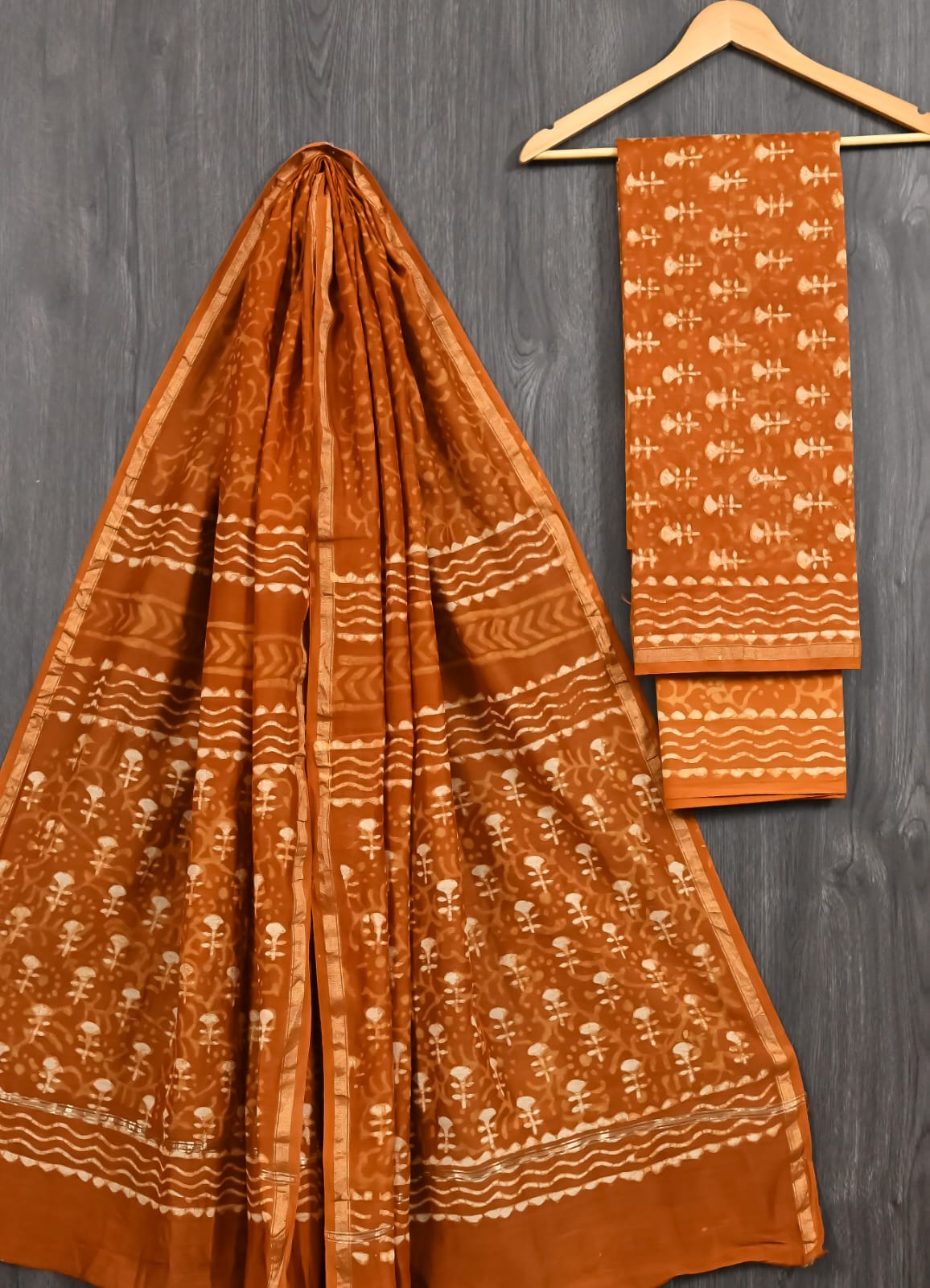 Rust Orange Dabu Print Chanderi Silk Suit